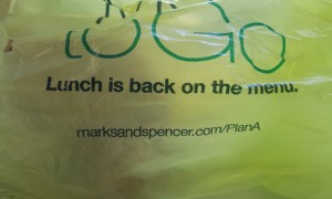 Green bag with the words "Lunch is back on the menu"